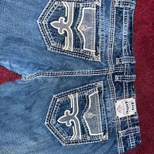 Rock Revival Blue Boot Cut Jeans with Decorative Stitching
